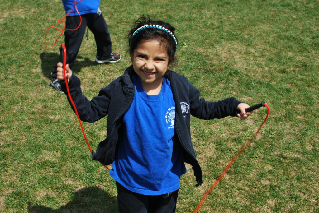 Enjoying the jump rope and the sunshine