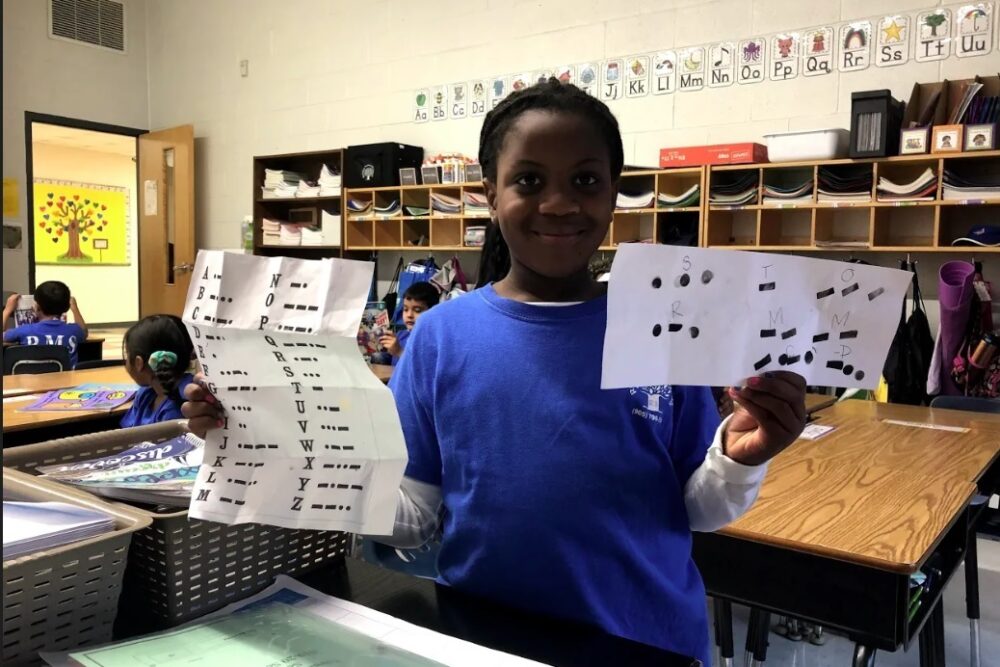 A Student Coding Her Teacher's Name